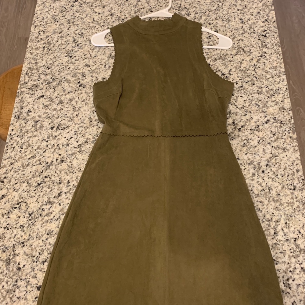 Green faux suede sleeveless dress with scalloped detailing